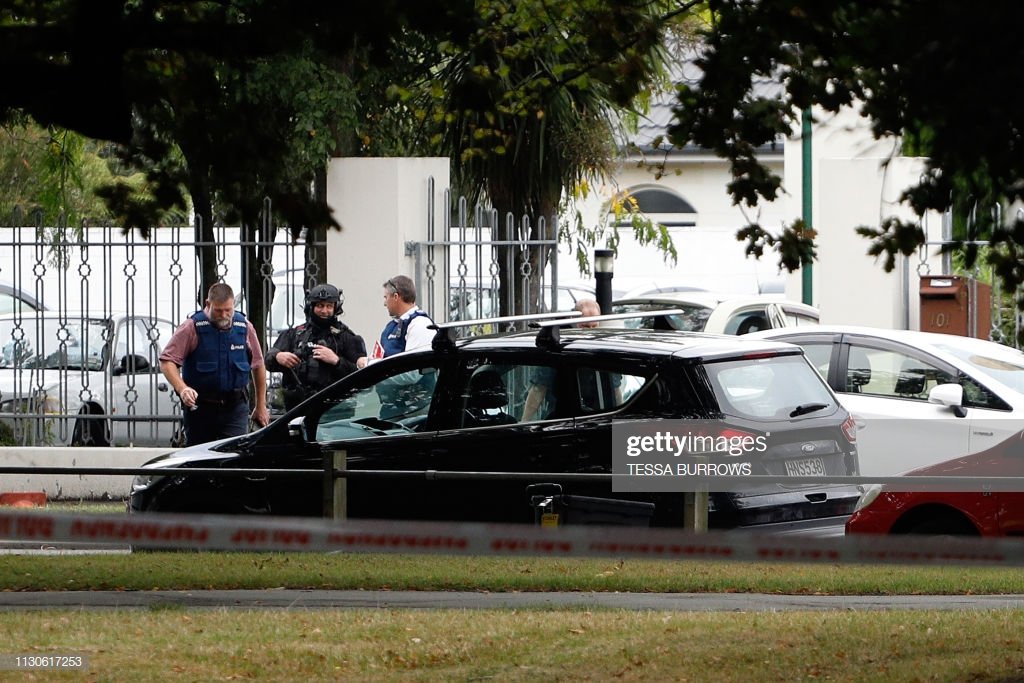 Police officers are seen at the Masjid al Noor mosque after a shooting incident in Christchurch on March 15, 2019. - Attacks on two Christchurch mosques left at least 49 dead on March 15, with one gunman -- identified as an Australian extremist -- apparently livestreaming the assault that triggered the lockdown of the New Zealand city. (Photo by Tessa BURROWS / AFP)        (Photo credit should read TESSA BURROWS/AFP/Getty Images)